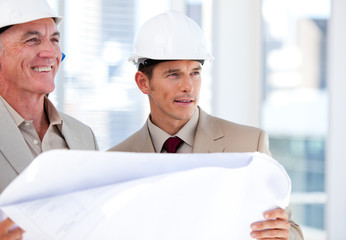 Architects partners looking at the building