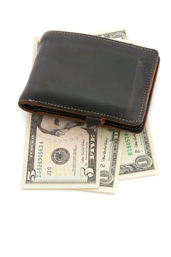 leather wallet with money isolated on white background