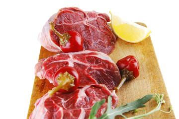 fresh beef medallion on wood