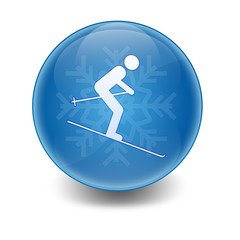 Esfera brillante con simbolo esquiador