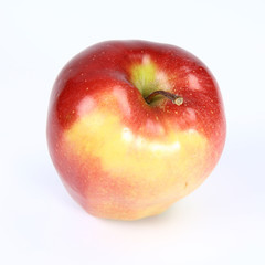 Red and yellow apple on white background