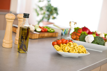 Italian food - pasta, tomato, ingredients for cooking