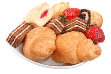 Fresh buns on a plate isolated