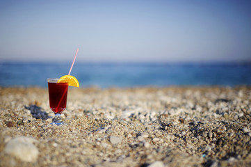 Tropical fresh juice on a beach