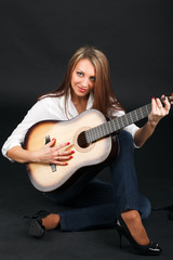 Woman with guitar.