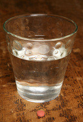 Glass of water with vitamin studio portrait