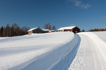 Small wooden houses in winter.