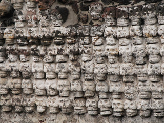 Wall of stone skulls