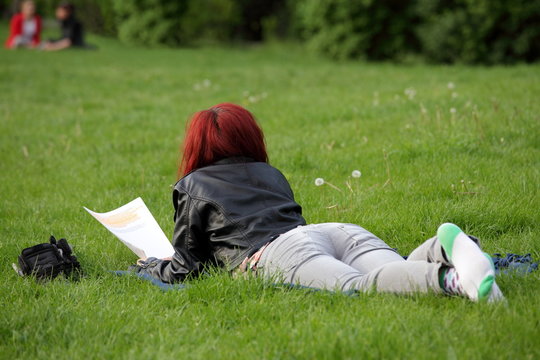 Student girl resting in a park