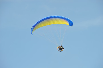 paraglider flying in the sky