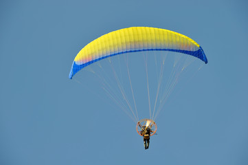 paraglider flying in the sky
