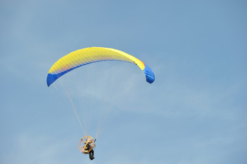 paraglider flying in the sky