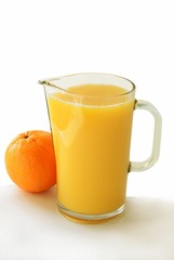 jug of juice and orange fruit