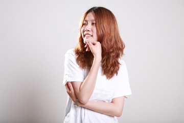 Asian female model posing in bright white t-shirt
