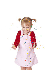 happy little girl with confetti