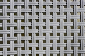 Fototapeta premium Plastic grille with small square holes for background