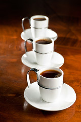 Three cups of hot coffee