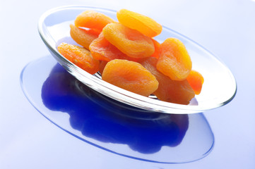 Dried apricots on plate