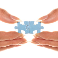 Two light blue pieces of puzzle are connected together