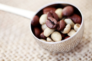 spoon of coffee beans