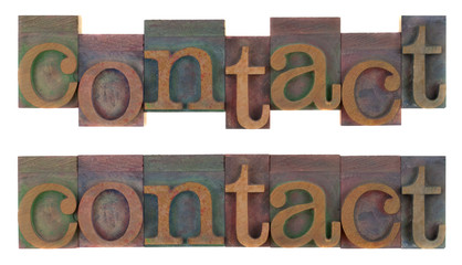 contact - old wooden letterpress type