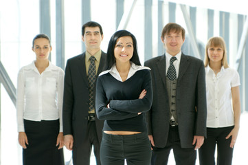 Group of five young and smart business people