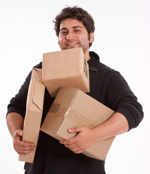 Man struggling with lots of parcels