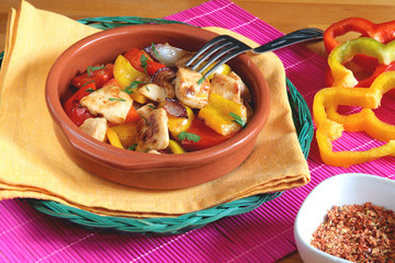 Chicken with red and yellow peppers