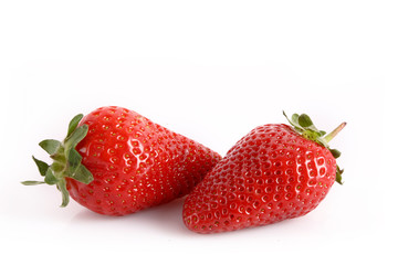 Two strawberries isolated on white
