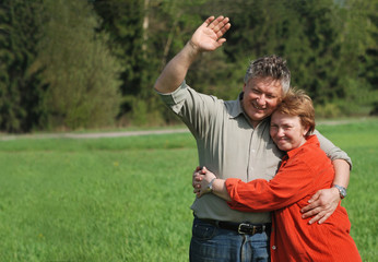 Mature couple in love send greetings