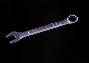 Crome Spanner on a plain black background