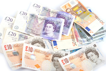 Obraz na płótnie Canvas pile of British and Euro money
