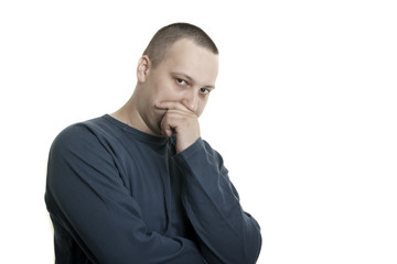 suspicious young caucasian man with short hair and beard