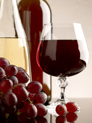 winery still life on the glass with red and white wine