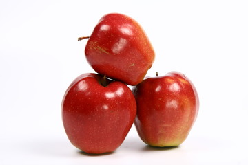 Fototapeta na wymiar Three red apples on white background