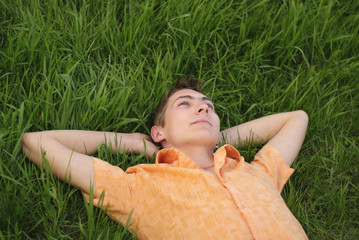 Man lie on the grass