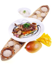 fried chicken adobo, rice & fresh mango isolated on white