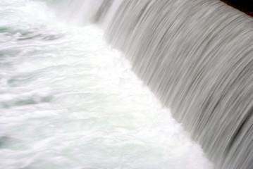 Fototapeta na wymiar River with waterfall
