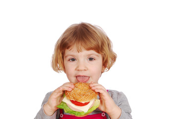 little girl eating sandwich