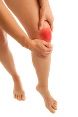 Woman massaging pain knee