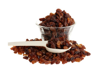 raisins with bowl and measuring spoon