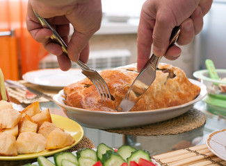 Man cut meat pie