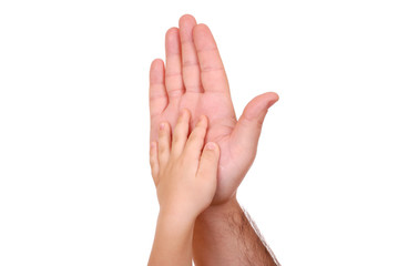 Obraz premium Hand shake of the child and father