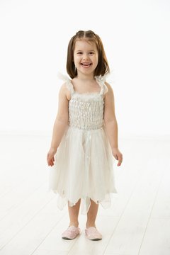 Smiling little girl in ballet costume