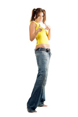 Young woman in wide jeans