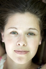 Fototapeta premium Portrait of young adult woman with health skin of face