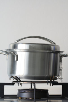 Saucepan made of stainless stee on white background