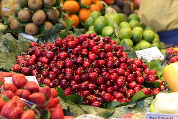 Heap of cherries on market