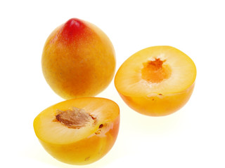 yellow plums isolated on white background