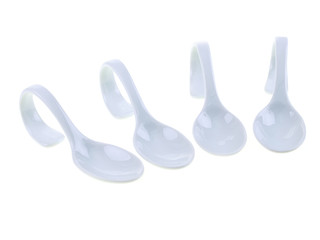 empty white spoons to fill up isolated on white background